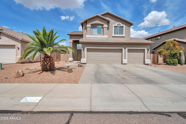 2210 W Goldmine Mountain Dr, Queen Creek, AZ 85144 - view of front of home featuring a garage, a tile roof, fence, concrete driveway, and stucco siding