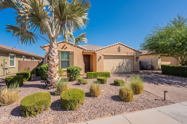2680 E Daniel Dr, Gilbert, AZ 85298 - mediterranean / spanish home with an attached garage, stucco siding, driveway, and a tile roof
