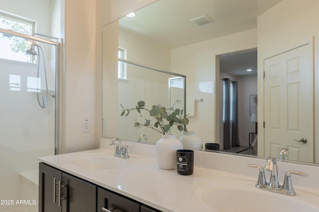 2680 E Daniel Dr, Gilbert, AZ 85298 - full bathroom featuring double vanity, plenty of natural light, and a shower