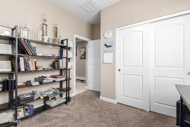 interior space featuring light colored carpet