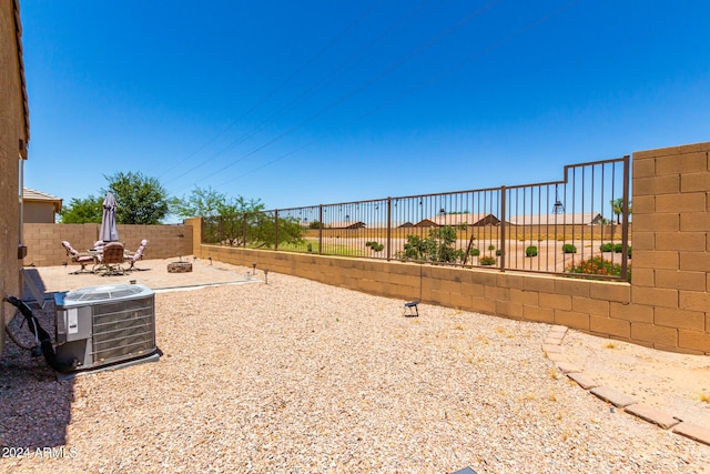 exterior space with a patio and central AC