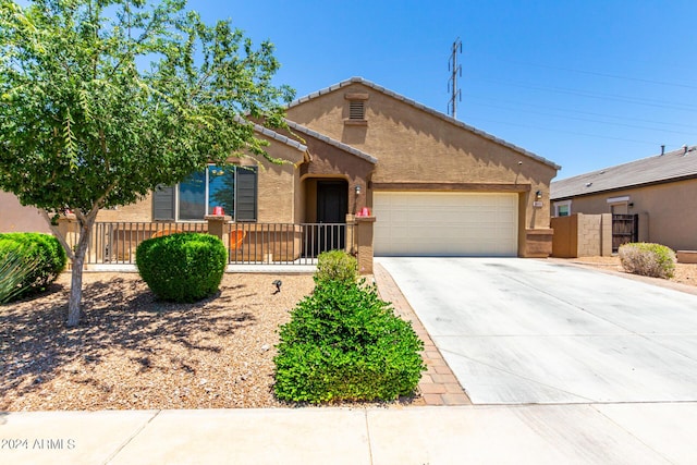 view of front of property featuring a garage