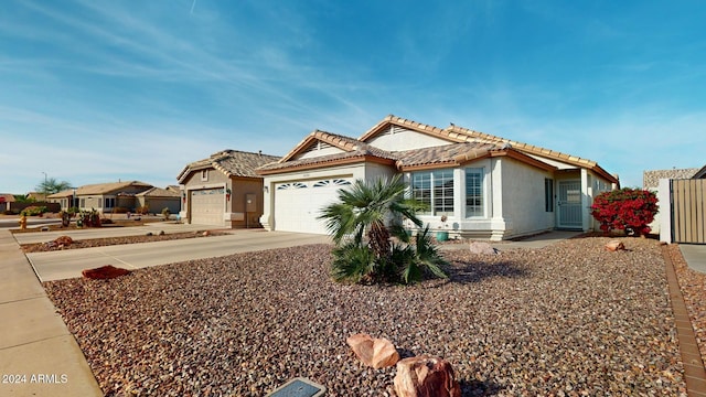 view of front of home with a garage