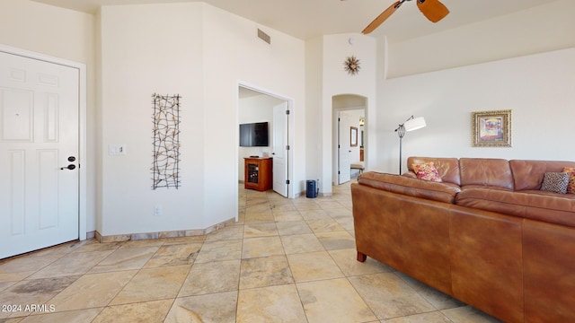 living room featuring ceiling fan