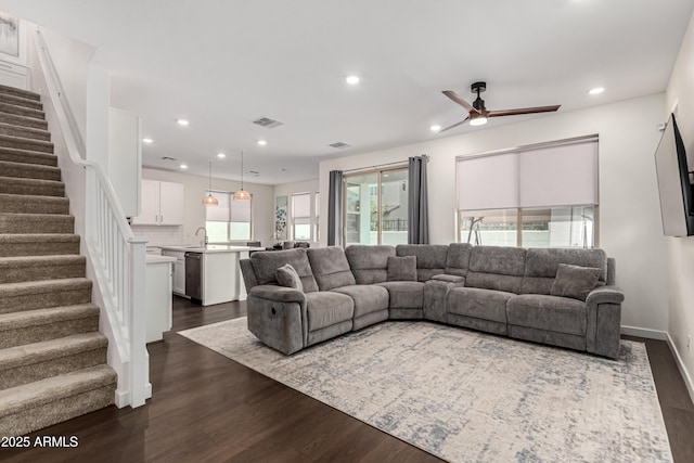 9901 E Tamery Ave, Mesa, AZ 85212 - living room featuring a ceiling fan, dark wood-style floors, stairway, and recessed lighting