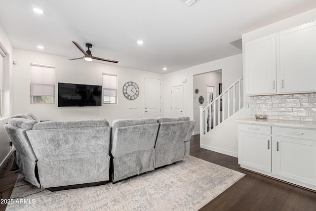 9901 E Tamery Ave, Mesa, AZ 85212 - living area with dark wood-style flooring, stairway, a ceiling fan, recessed lighting, and baseboards