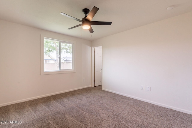 3620 E Ludlow Dr, Phoenix, AZ 85032 - carpeted spare room with baseboards, a ceiling fan, and a smoke detector