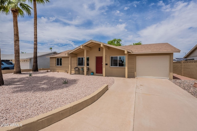 3620 E Ludlow Dr, Phoenix, AZ 85032 - single story home with an attached garage, driveway, and stucco siding