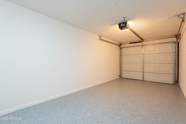 3620 E Ludlow Dr, Phoenix, AZ 85032 - garage with a garage door opener and baseboards