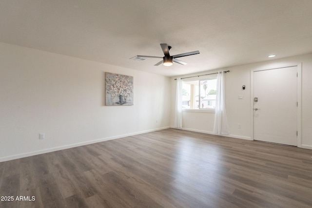 3620 E Ludlow Dr, Phoenix, AZ 85032 - unfurnished living room featuring a ceiling fan, wood finished floors, baseboards, and recessed lighting