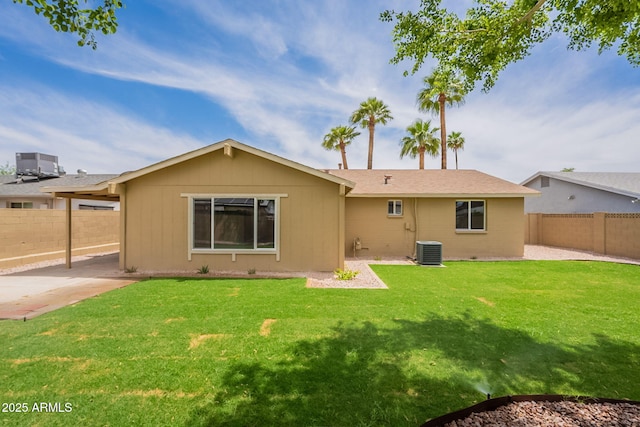 3620 E Ludlow Dr, Phoenix, AZ 85032 - back of house featuring central AC and a patio