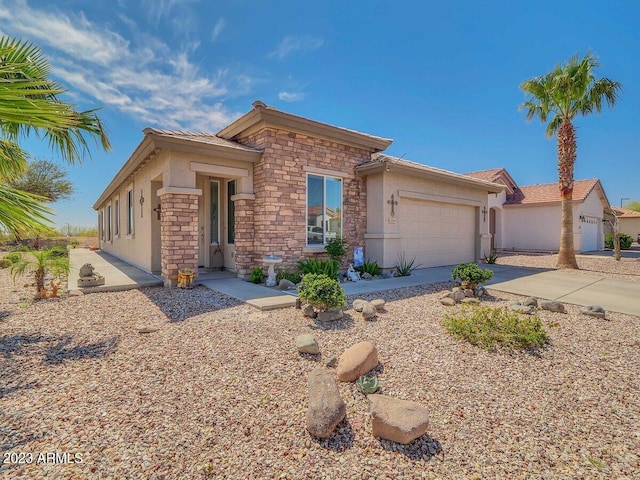 ranch-style home with a garage