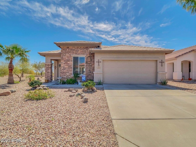 view of front of property featuring a garage