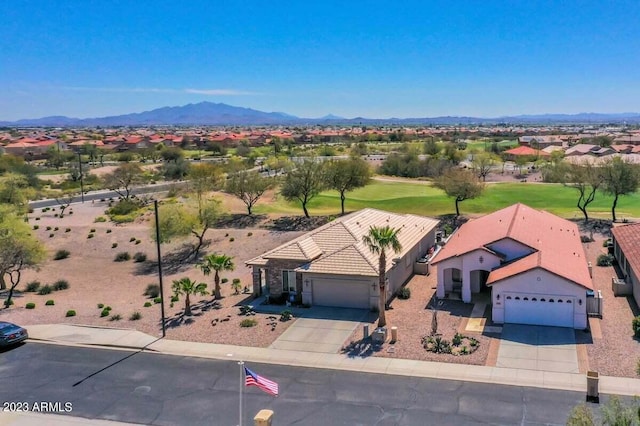 birds eye view of property featuring a mountain view