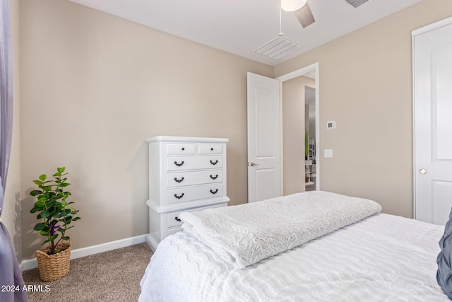 carpeted bedroom featuring ceiling fan