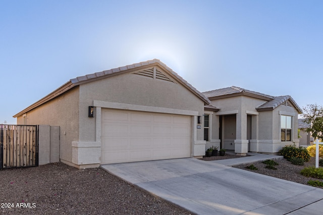 view of front of property with a garage