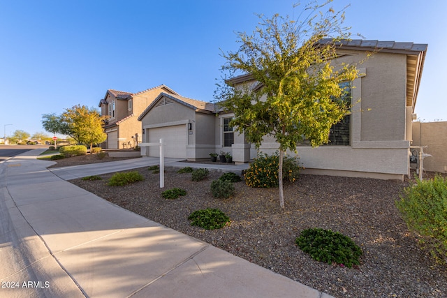 view of front of property featuring a garage