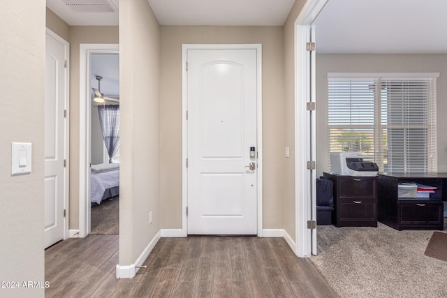 entrance foyer with ceiling fan and hardwood / wood-style flooring