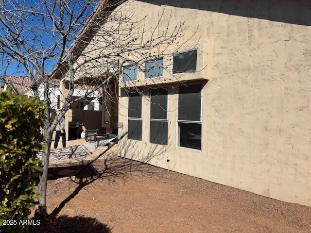 view of home's exterior with a patio