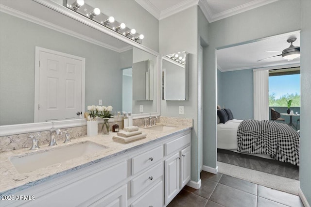 ensuite bathroom featuring tile patterned floors, ensuite bathroom, double vanity, and a sink
