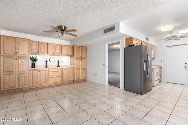 kitchen with stainless steel fridge with ice dispenser, white electric range, a textured ceiling, and ceiling fan