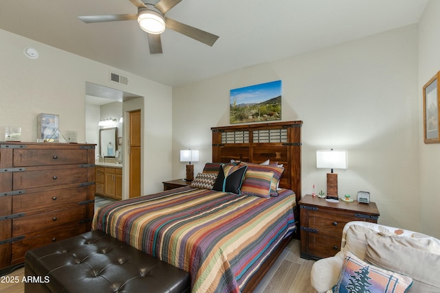 bedroom with ceiling fan and ensuite bathroom