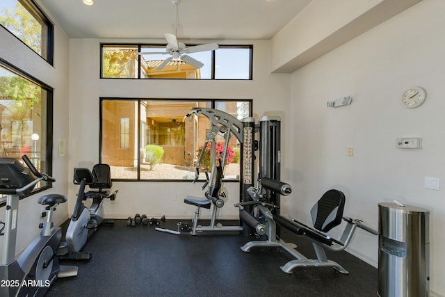 exercise room with ceiling fan