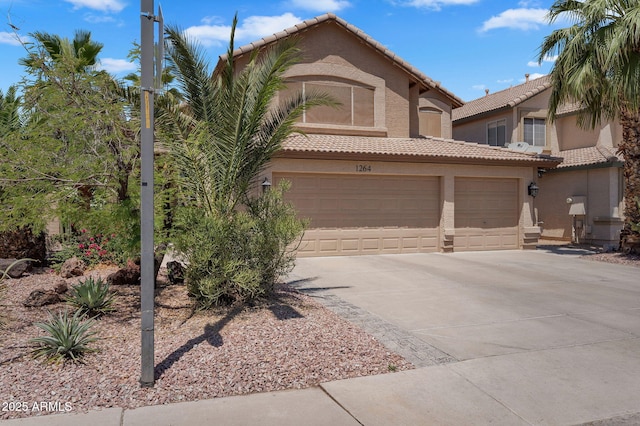 1264 S Sierra St, Gilbert, AZ 85296 - view of front of home featuring a tile roof, driveway, stucco siding, and an attached garage