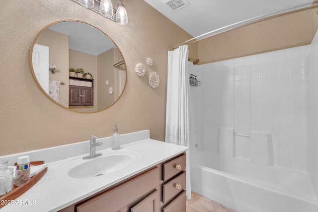 1264 S Sierra St, Gilbert, AZ 85296 - bathroom featuring vanity, shower / tub combo with curtain, and a textured wall