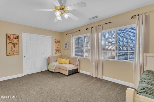 1264 S Sierra St, Gilbert, AZ 85296 - sitting room featuring healthy amount of natural light, baseboards, ceiling fan, and carpet flooring
