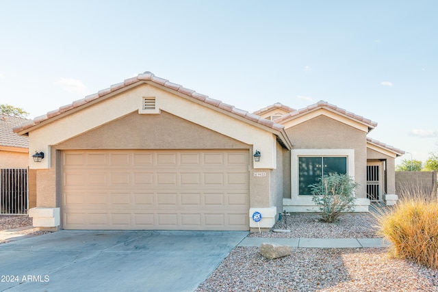 view of front of property with a garage