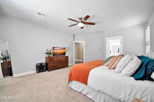 carpeted bedroom featuring ceiling fan and connected bathroom