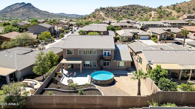 drone / aerial view featuring a mountain view