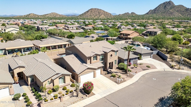 bird's eye view with a mountain view