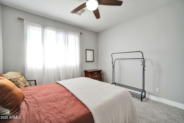 bedroom featuring ceiling fan and carpet floors