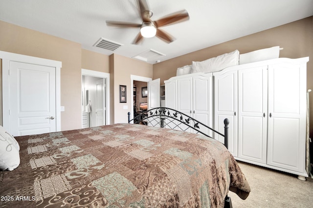 bedroom featuring light carpet, a closet, and ceiling fan