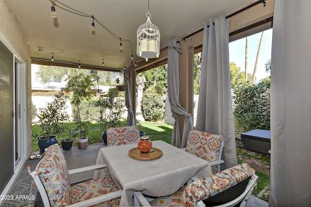 sunroom featuring a wealth of natural light