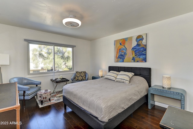 bedroom with wood-type flooring