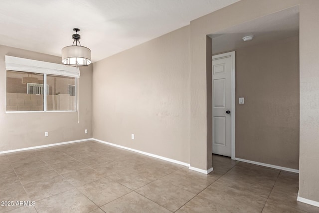 view of tiled empty room