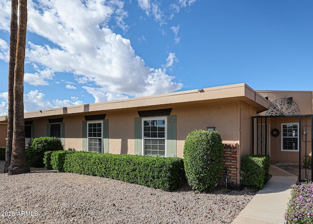 view of front of home featuring stucco siding