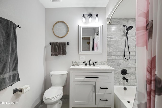 full bathroom with vanity, toilet, and shower / tub combo