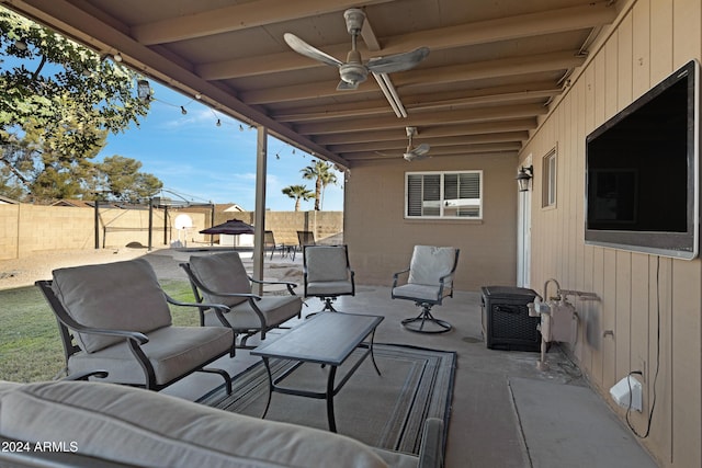 view of patio featuring ceiling fan