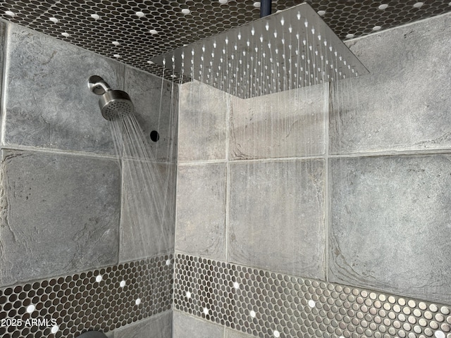details with a tile shower