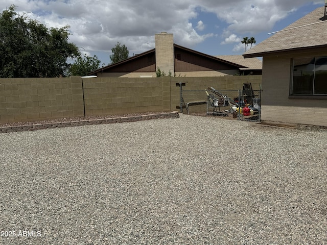view of yard featuring fence