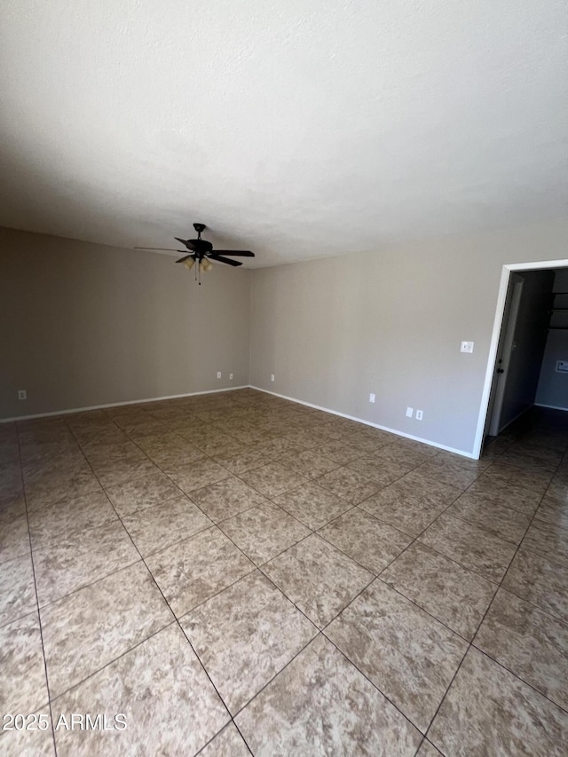 662 W Laguna Azul Ave, Mesa, AZ 85210 - empty room featuring ceiling fan and tile patterned floors