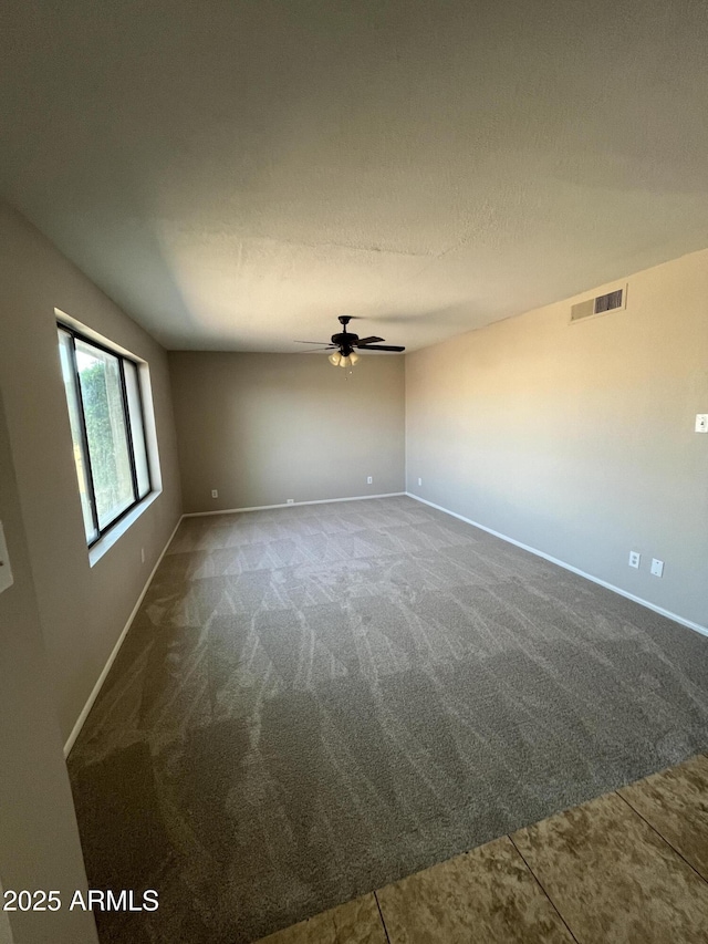 662 W Laguna Azul Ave, Mesa, AZ 85210 - unfurnished room featuring ceiling fan and carpet flooring
