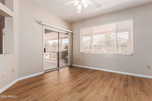 empty room featuring light hardwood / wood-style floors and ceiling fan