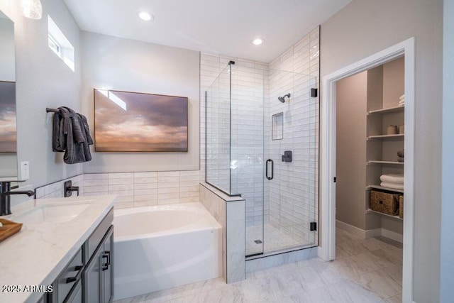 12239 W Caraveo Pl, Peoria, AZ 85383 - full bath with a bath, a stall shower, vanity, marble finish flooring, and recessed lighting