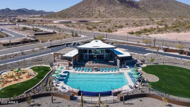 12239 W Caraveo Pl, Peoria, AZ 85383 - community pool featuring a mountain view