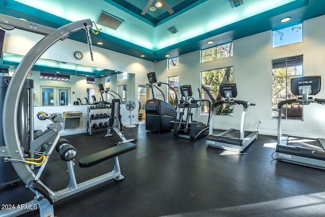 workout area featuring baseboards and visible vents